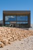 Modern home with Exterior, Metal Roof Material, Concrete Siding Material, House Building Type, Flat RoofLine, and Metal Siding Material. exterior/human element Photo 19 of The Rubber Ducky Trail House