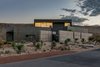 Modern home with Exterior, House Building Type, Metal Roof Material, Metal Siding Material, Stucco Siding Material, Flat RoofLine, and Stone Siding Material. exterior twilight Photo 10 of The Rubber Ducky Trail House