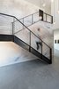 Modern home with Staircase, Wood Tread, Wood Railing, Metal Railing, Metal Tread, and Cable Railing. staircase/human element Photo 20 of The Rubber Ducky Trail House