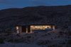 Modern home with Exterior, Metal Siding Material, Flat RoofLine, Metal Roof Material, House Building Type, and Concrete Siding Material. twilight/environment image Photo 4 of The Arroyo House