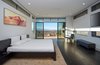 Modern home with Bedroom, Ceiling Lighting, Bed, and Dark Hardwood Floor. master bed view Photo 5 of Cloud Chaser