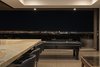 Modern home with Living Room, Ceiling Lighting, and Limestone Floor. game room view Photo 3 of Cloud Chaser