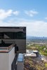 Modern home with Windows and Casement Window Type. Profile image of the Glass Cube (master bedroom) overlooking the city Photo 9 of The Huhn House