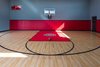 Modern home with Living Room, Ceiling Lighting, and Medium Hardwood Floor. Gym. Photo 10 of The Huhn House