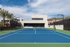 Modern home with Exterior, Concrete Siding Material, Stucco Siding Material, Metal Siding Material, Flat RoofLine, House Building Type, and Metal Roof Material. Tennis court/exterior grounds Photo 18 of The Huhn House