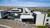 Modern home with Exterior, Stucco Siding Material, Concrete Siding Material, House Building Type, Metal Siding Material, Flat RoofLine, and Metal Roof Material. Overlooking the city Photo 4 of The Huhn House