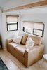 Modern home with Living Room, Light Hardwood Floor, and Sofa. This amazing love seat has storage underneath the seat cushions! Isn't that genius? Especially in a trailer! Photo 9 of The Cougar