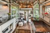 Modern home with Kitchen, Medium Hardwood Floor, Cooktops, Refrigerator, and White Cabinet. Kitchen + Interior Photo 9 of The Alpha