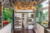 Modern home with Living Room and Medium Hardwood Floor. Interior Photo 8 of The Alpha