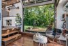 Modern home with Living Room, Chair, and Medium Hardwood Floor. Living Room + Patio Photo 11 of The Alpha
