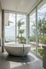 Modern home with Bath Room. "Out of the Blue" Touzet Residence at Cat Cay Photo 5 of Touzet Studio Designs Resilient Beachside Residence in Cat Cay