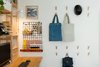 Modern home with Office, Lamps, Chair, Storage, Bookcase, Desk, Medium Hardwood Floor, Shelves, and Study Room Type. The Multifunctional Study Room Photo 10 of The Flea Market Apartment