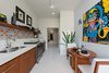 Modern home with Kitchen, Engineered Quartz Counter, Refrigerator, and Wood Cabinet. Kitchen Photo 11 of Casa Picasso