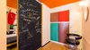 Modern home with Bedroom, Ceiling Lighting, Medium Hardwood Floor, Chair, Bed, Wall Lighting, and Wardrobe. Sliding door, 2017 Photo 9 of Corbusier Re-Renovation Berlin