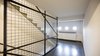Modern home with Staircase, Concrete Tread, Metal Railing, and Stone Tread. Original Stair, le Corbusier 1958 Photo 13 of Corbusier Re-Renovation Berlin