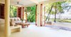 Modern home with Living Room, Concrete Floor, and Coffee Tables. Sandy Lane - Open and light filled living space Photo 16 of The Beach Estates - Santa Teresa, Costa Rica - Stylish Beachfront Retreats