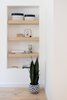 The theme of open oak shelving continues into the guest bedroom which includes it's own ensuite bath. Photo 17 of Raber By VEIN modern home
