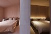 Modern home with Bedroom, Light Hardwood Floor, Medium Hardwood Floor, Bed, Wall Lighting, Ceiling Lighting, Table Lighting, and Floor Lighting. bed rooms Photo 13 of My Kyoto Town House