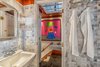 Modern home with Bath Room, Marble Wall, Ceiling Lighting, Recessed Lighting, Open Shower, Pedestal Sink, Marble Floor, Mosaic Tile Wall, and One Piece Toilet. Bathroom (white marble tile) to hallway (original tongue and groove oak flooring) Photo 11 of The Yacht House
