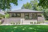Modern home with Exterior, House Building Type, Shingles Roof Material, Brick Siding Material, and Wood Siding Material. Front of house Photo of the Humble Ranch- Re-Imagined