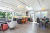 Modern home with Kitchen. White Oak flooring, custom stained, two toned cabinets Photo 6 of the Humble Ranch- Re-Imagined