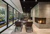 Modern home with Living Room, Chair, Ceiling Lighting, Corner Fireplace, Light Hardwood Floor, Coffee Tables, and Sofa. Relation between exterior and interior spaces Photo 5 of Apartment in Ahuehuetes Norte