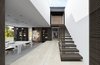 Modern home with Office, Desk, Shelves, Concrete Floor, Craft Room Room Type, Chair, Bookcase, Storage, Study Room Type, and Ceramic Tile Floor. The Art Atelier Photo 9 of Home & Art studio for Mrs L