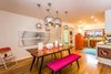 Modern home with Dining Room, Table, Chair, Bench, Pendant Lighting, and Light Hardwood Floor. Dine in happiness, always. Photo 4 of Wren's Nest