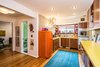 Modern home with Hallway and Light Hardwood Floor. Sleek, modern cherry kitchen gives a retro look with extra amenities. Photo 6 of Wren's Nest