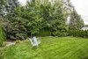 Modern home with Outdoor, Grass, Trees, Concrete Patio, Porch, Deck, and Small Patio, Porch, Deck. Serene green oasis, all to yourself. Photo 14 of Wren's Nest