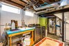 Ideally quiet basement laundry with Samsung appliances and printer for home office needs. Photo 16 of Wren's Nest modern home