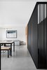 Modern home with Living Room, Concrete Floor, and Bench. The living room couch is from Élément de base. Radiant heating is built into the polished concrete floors (Atelier B). Photo 6 of Bessborough Residence