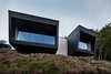 Modern home with Exterior, Wood Siding Material, Metal Roof Material, Cabin Building Type, Shed RoofLine, and House Building Type. The first volume contains the living areas, while the second contains two bedrooms. Photo 11 of La Binocle