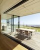 Modern home with Kitchen. As the design of this unique structure was oriented toward the exterior panoramic view, special attention was paid to the living spaces, such as the lounge seating with fireplace, and the diagonally adjacent kitchen.
Photo 5 of Where the Eagles Live