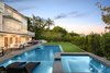 Modern home with Outdoor, Grass, Swimming Pools, Tubs, Shower, Lap Pools, Tubs, Shower, Back Yard, and Trees. The expansive backyard with pool/spa and custom-built BBQ with Lynx appliances. Photo 6 of Sorrento