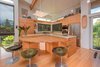 Modern home with Kitchen. As ever, everything comes together in the kitchen. Photo 5 of Tropical Sanctuary