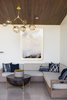 Modern home with Living Room, Sofa, Ceiling Lighting, Coffee Tables, Pendant Lighting, Recessed Lighting, and Concrete Floor. Modern pool house, designed by JBellessa Design. Indoor-outdoor living. Light Fixture: Lindsey Adelman Photo 7 of Modern Mountain Pool House