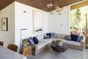 Modern home with Living Room, Coffee Tables, Bar, Sofa, Accent Lighting, Floor Lighting, Pendant Lighting, End Tables, Recessed Lighting, Ceiling Lighting, and Concrete Floor. Modern pool house, designed by JBellessa Design. Indoor-outdoor living. Photo 5 of Modern Mountain Pool House