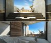 Modern home with Bedroom, Chair, Concrete Floor, and Bed. view from the suites Photo 2 of CasaPlutonia Retreat
