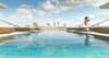 Modern home with Outdoor, Concrete Patio, Porch, Deck, Trees, Large Patio, Porch, Deck, Back Yard, Large Pools, Tubs, Shower, Swimming Pools, Tubs, Shower, and Infinity Pools, Tubs, Shower. swimming pool Photo 7 of CasaPlutonia Retreat