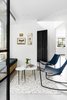 Modern home with Living Room, Chair, Bench, Coffee Tables, Rug Floor, Ceiling Lighting, and Porcelain Tile Floor. Living area Photo 8 of MG House