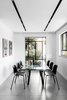 Modern home with Chair, Ceiling Lighting, and Porcelain Tile Floor. Dinning area Photo 13 of MG House