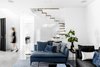 Modern home with Living Room, Porcelain Tile Floor, Ceiling Lighting, and Sofa. Living area Photo 4 of MG House