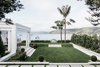 Modern home with Outdoor, Shrubs, Stone Patio, Porch, Deck, Grass, Back Yard, Pavers Patio, Porch, Deck, Trees, and Gardens. Views to Pittwater Photo of Palm Beach House