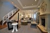 Modern home with Living Room, Floor Lighting, End Tables, Table Lighting, Medium Hardwood Floor, Bench, Chair, Ottomans, Coffee Tables, Recessed Lighting, Ceiling Lighting, Standard Layout Fireplace, Wood Burning Fireplace, and Sofa. Michael Molesky Interior Design. Modern living room in a historic DC townhouse. Multi-tone grays and rich textures create an elegant and comfortable feel. Photo 5 of Historic Townhouse Made Modern