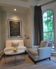 Modern home with Living Room, Chair, Bench, Coffee Tables, Recessed Lighting, Floor Lighting, and Medium Hardwood Floor. Michael Molesky Interior Design. Intimate corner of a modern living room in DC townhouse. White velvet bench accentuates the client's black and white Keith Hering original chalk drawing. Photo 3 of Historic Townhouse Made Modern