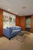 Modern home with Bedroom, Wardrobe, Bench, Recessed Lighting, and Chair. Michael Molesky Interior Design. Modern master bedroom sitting are in a DC townhouse. A new sofa fits perfectly in the niche and complements the client's art. Photo 9 of Historic Townhouse Made Modern