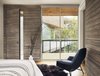 Modern home with Bedroom, Recessed Lighting, Medium Hardwood Floor, Rug Floor, Bed, Ceiling Lighting, Wall Lighting, and Chair. View of bedroom and outdoor porch by Low Design Office Photo 6 of Guadalupe River House