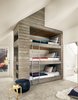 Modern home with Kids Room, Bunks, Playroom Room Type, Family Room Room Type, Chair, Shelves, Storage, Bedroom Room Type, Bed, Rug Floor, Carpet Floor, Neutral Gender, Teen Age, Pre-Teen Age, and Toddler Age. View of triple bunk bed and outdoor roof deck by Low Design Office Photo 8 of Guadalupe River House