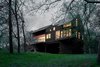 View from river Photo 16 of Guadalupe River House modern home